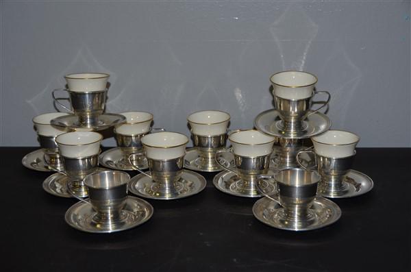 12 Pc. Sterling Demitasse Set w/ Lenox Liners: Spring Glory by International Silver. 25.6 ozs. (Silver only) 2 Lenox Liners missing. Monogrammed w/ "M"