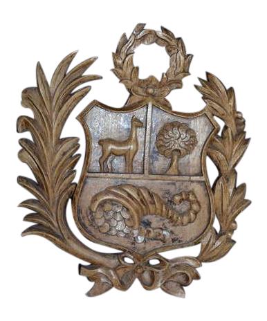 Peruvian Coat Of Arms Carved Wood Panel: SIZE: 18 1/2" H X 15 3/4" H PROVENANCE: Property from the private estate collection of a Peruvian gentleman; Houston, Texas.