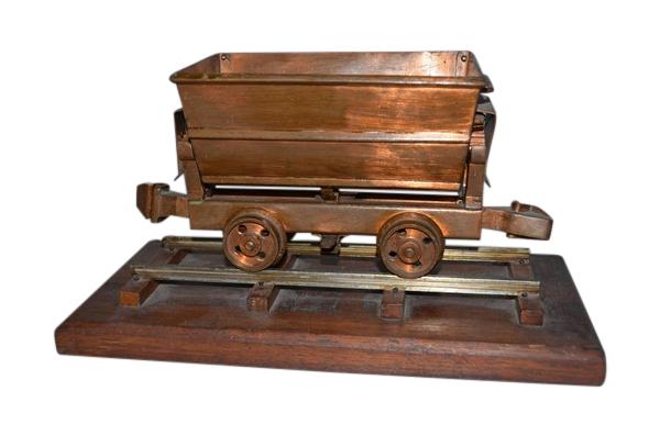 Functioning Scale Model of an Ore Cart in Copper: SIZE: 6 1/2" H x 12 1/2" W x 6 1/2" D PROVENANCE: Property from the private estate collection of a Peruvian gentleman; Houston, Texas.