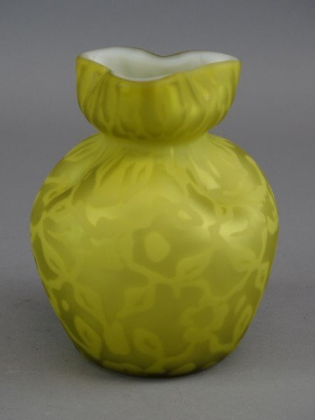 Victorian Mother of Pearl Satin Glass Vase: The mother of pearl satin glass vase in canary yellow with flower and acorn pattern and crimped rim. Condition report : Internal flaw to upper center on one side.