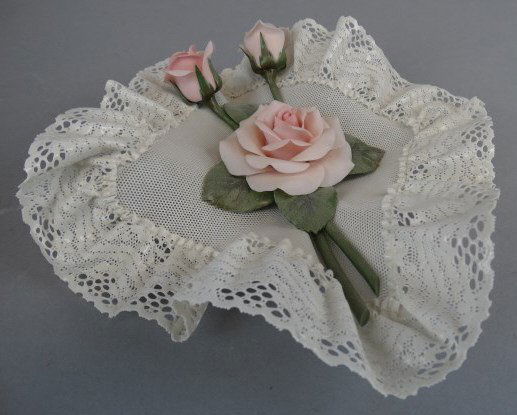 Lladro Caprichos Square Handkerchief with Rose: Lladro Caprichos Square Handkerchief with Rose Condition Report : Damage to top corner with some loss, as shown on picture. Size : 9" T