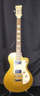 VINTAGE GOLD ITALIA MARANELLO GUITAR: VINTAGE GOLD ITALIA MARANELLO GUITARIn extremely fine condition solid body electric guitar with two humbucker pickups. Void of a serial number. Diamond hard shell case included.