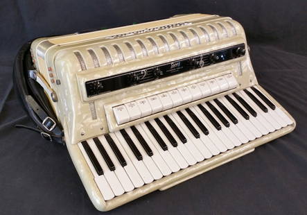 ITALIAN SANO PHILHARMONIC ACCORDION WITH CASE: ITALIAN SANO PHILHARMONIC ACCORDION WITH CASEVery fine condition both cosmetically and functionality. Pearlized finish. Tested. Period correct case. No noted issues. Fine example of vintage profession