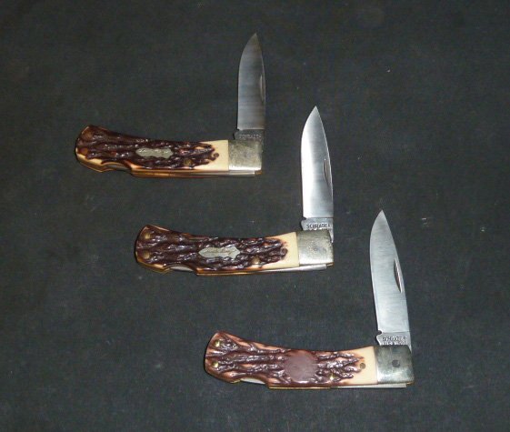 Three Schrade – Uncle Henry Folding Knives: One Schrade model # 50 T with 3 in blade and two model # 50 H with 2 ¾ in blades