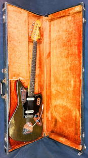 1962 Fender Jaguar Guitar | Pre CBS: This is the first year introduction of this iconic Fender Electric Jaguar guitar. -True barn find. Includes rare red back protection cover. This is being offered as found condition. We have not touche