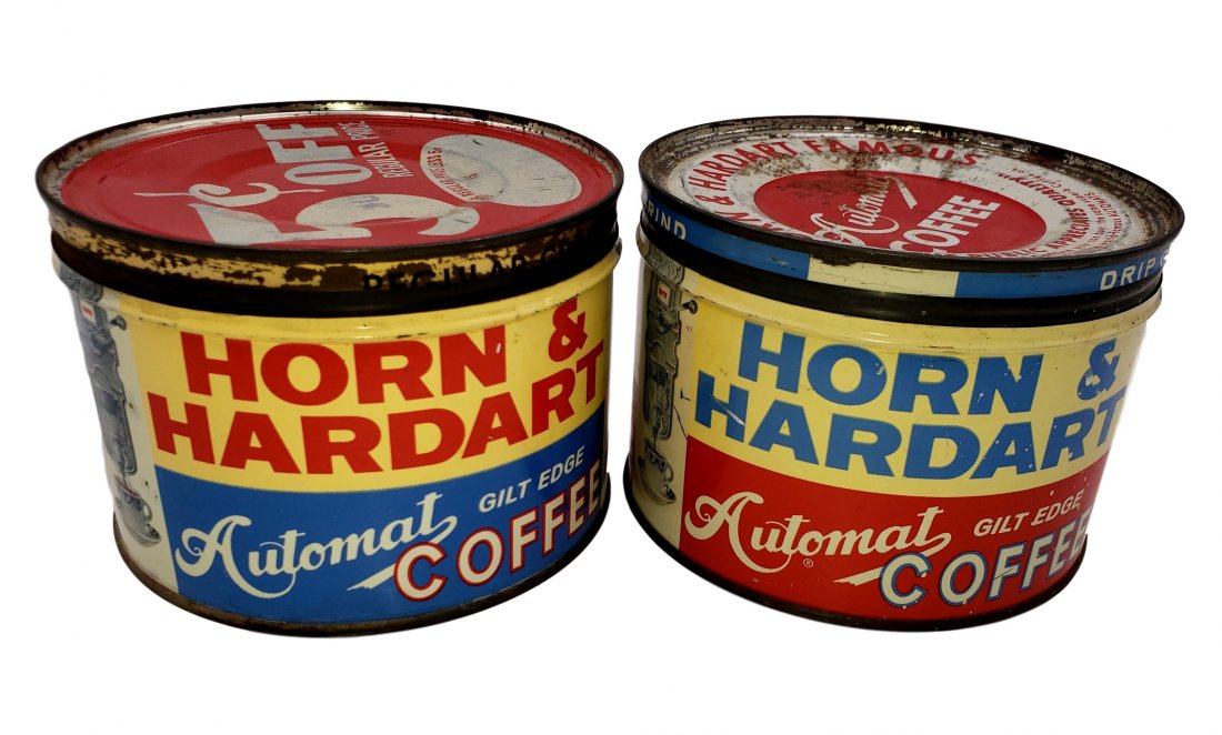 Horn & Hardart Automat Coffee Cans: Two Vintage Horn & Hardart Automat Coffee Can. Key open style one pound cans - vintage advertising. Surface rust and patina of storage/age noted to both. Size: 3.5 in high x 5 in diameter each.