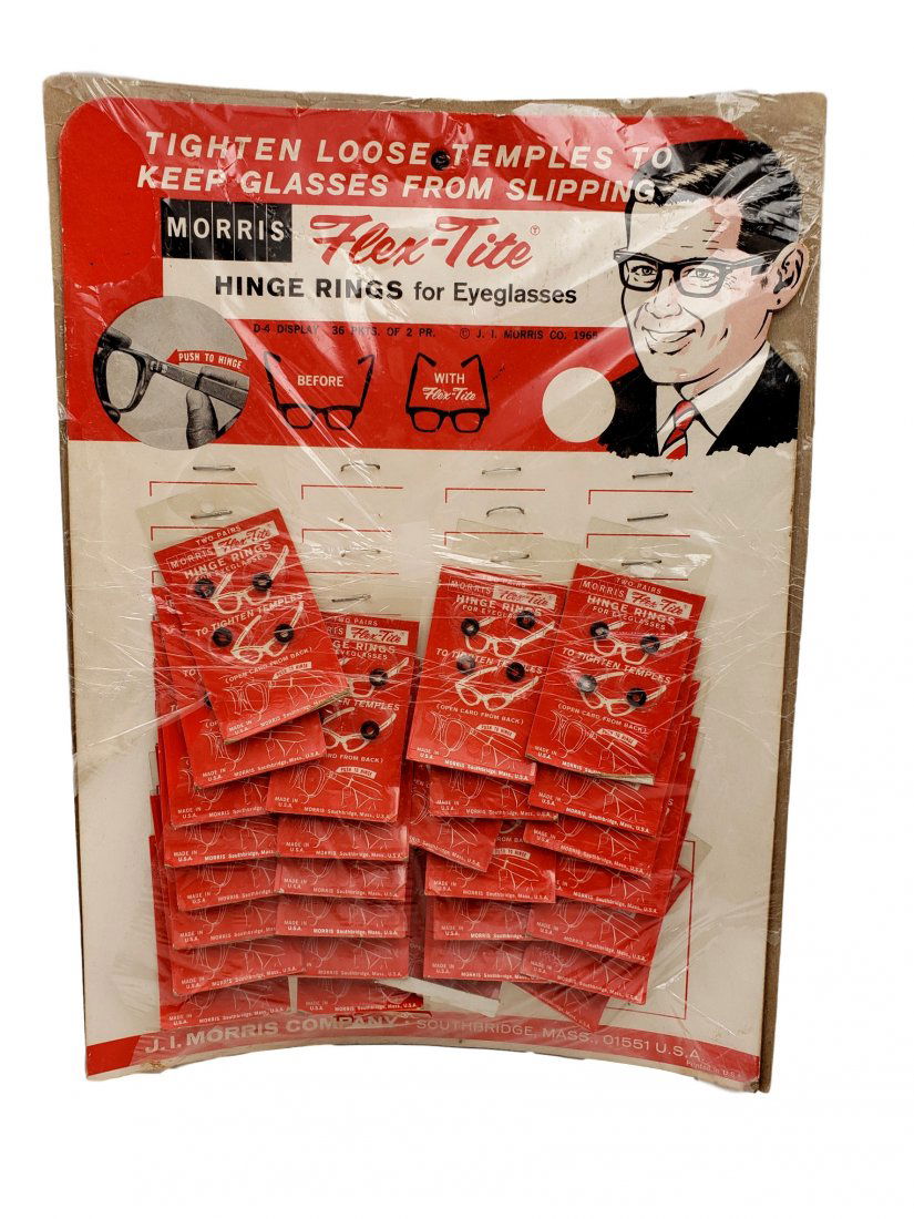 1965 Hing Rings for Eyeglasses POS Display w Product: Hing Rings for Eyeglasses Display with the product,1965 Advertising. Morris Flex-Tite Products - 28 packets on display card stock. Very good vintage condition. Slight curved to the card from storage n