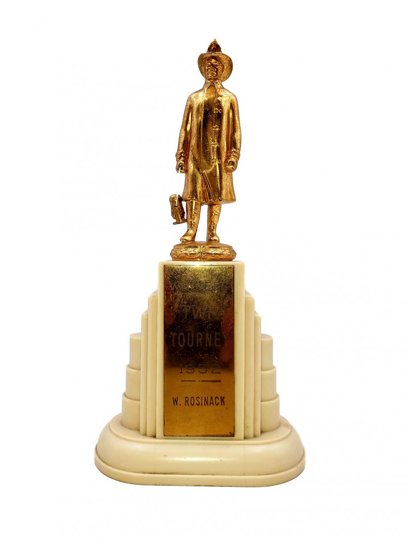 1952 Firefighters Trophy Winners of the TWP Tourney: Trophy - Firefighters - 1952 Winners of the TWP Tourney. Bakelite cream base in the form of a multi step plinth with a Fireman in turn out holding a lantern pendant ( note: lantern floss has been repl