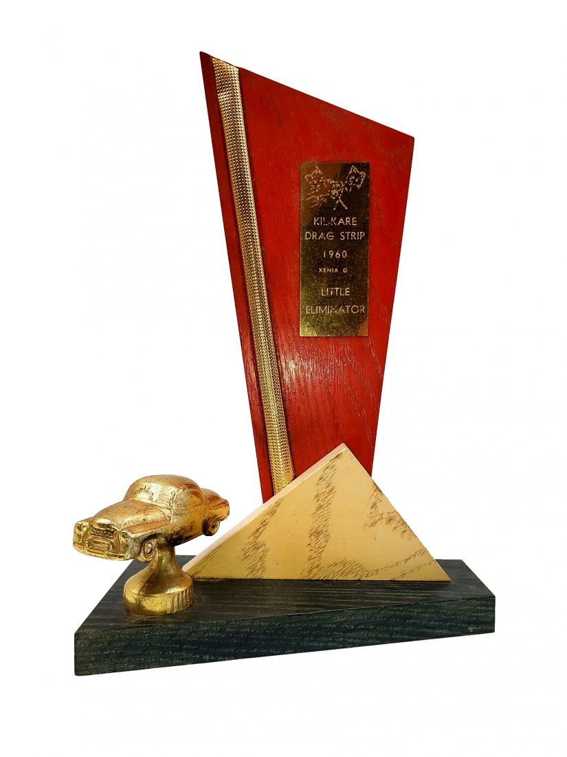 1960 Drag Trophy Xenia Ohio Little Eliminator: 1960 Drag Strip Trophy - Xenia Ohio: Little Eliminator Award. Metal and wood geometric award from the first year of business for the Kilkare Drag Strip of Xenia Ohio. 4x8 inch base 13 inches high.