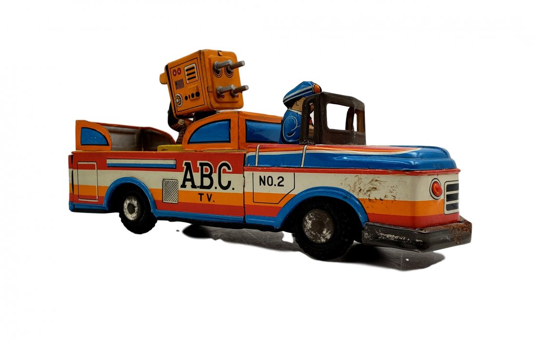 ABC T.V. Camera Truck Tin Friction Toy: Made in Japan - Tin Toy - ABC T.V. Camera Truck - Friction Toy. 1960 Vintage Tin Litho ABC TV Truck Friction Nishimura Japan Camera Man & Driver. Very good vintage condition, no losses noted. Mild to 