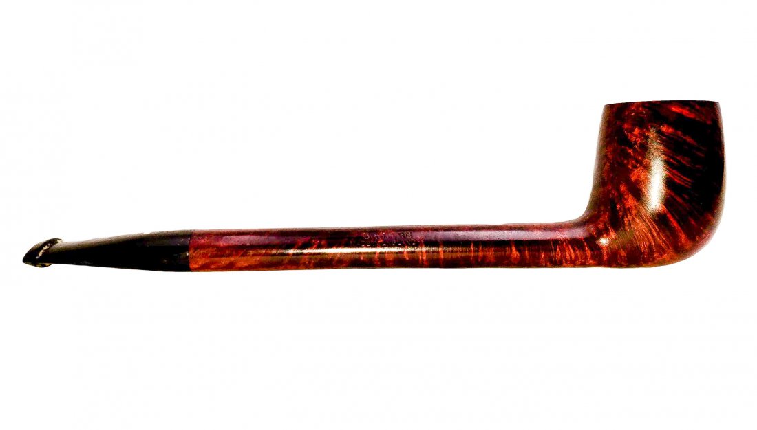 Dunhill White Spot Bruyere Canadian Style #4109 Pipe: Smooth finish, Canadian style bowl of Bruyere and long briar stem with a short black vulcanite tip. Made in England. Provenance The Bruce Cohn Collection. Modest wear and handling, moderate rim darken