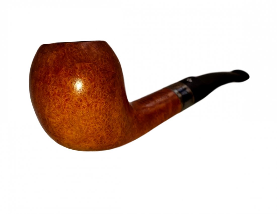 Peterson Sherlock Holmes : Strand Sterling Banded Pipe: Peterson Strand Style Sterling Banded Pipe.Smooth finish, Bent Egg style briar bowl with a gently bent vulcanite stem, sterling silver banded at mount. Made in Ireland. Provenance The Bruce Cohn Colle