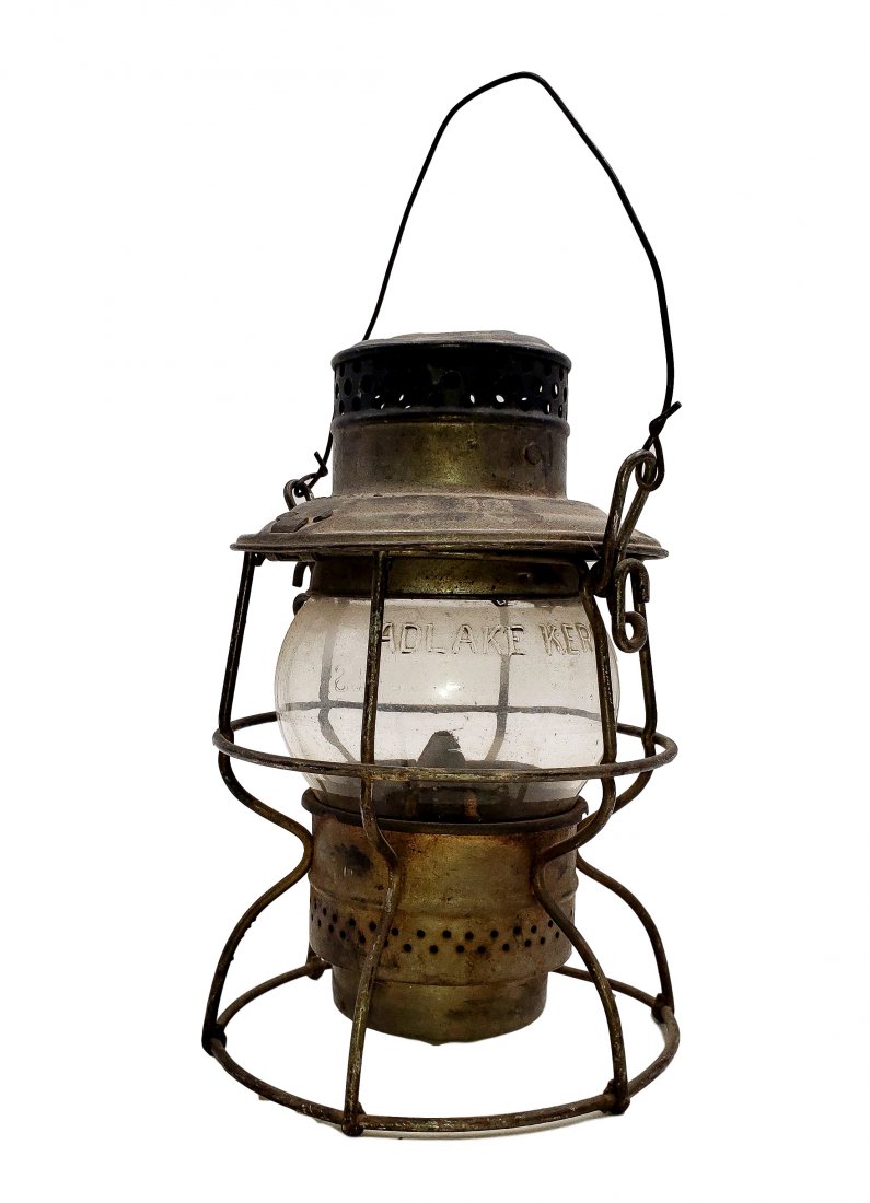 Adlake Kero 1-35 Circa 1923 RR Lantern: Globe marked -NY Clines -. Adlake Kerosene lantern model 1-35. Base reads Canada 1921-1923. Replacement wire bail. The very good antique condition with no chips or cracks to the glass. 9.5 inches high