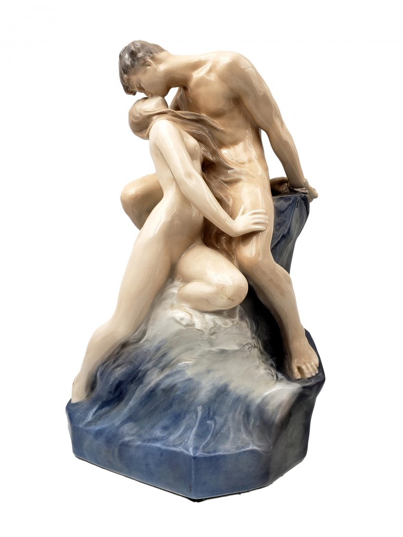 Theodor Lundber : Royal Copenhagen:Wave and Rock #1132: Theodor Lundberg for Royal Copenhagen Porcelain Sculpture "The Wave and Rock" #1132. This figurine stands an impressive 18.25 inches tall and depicts a romantic scene between a nymph and a man chained
