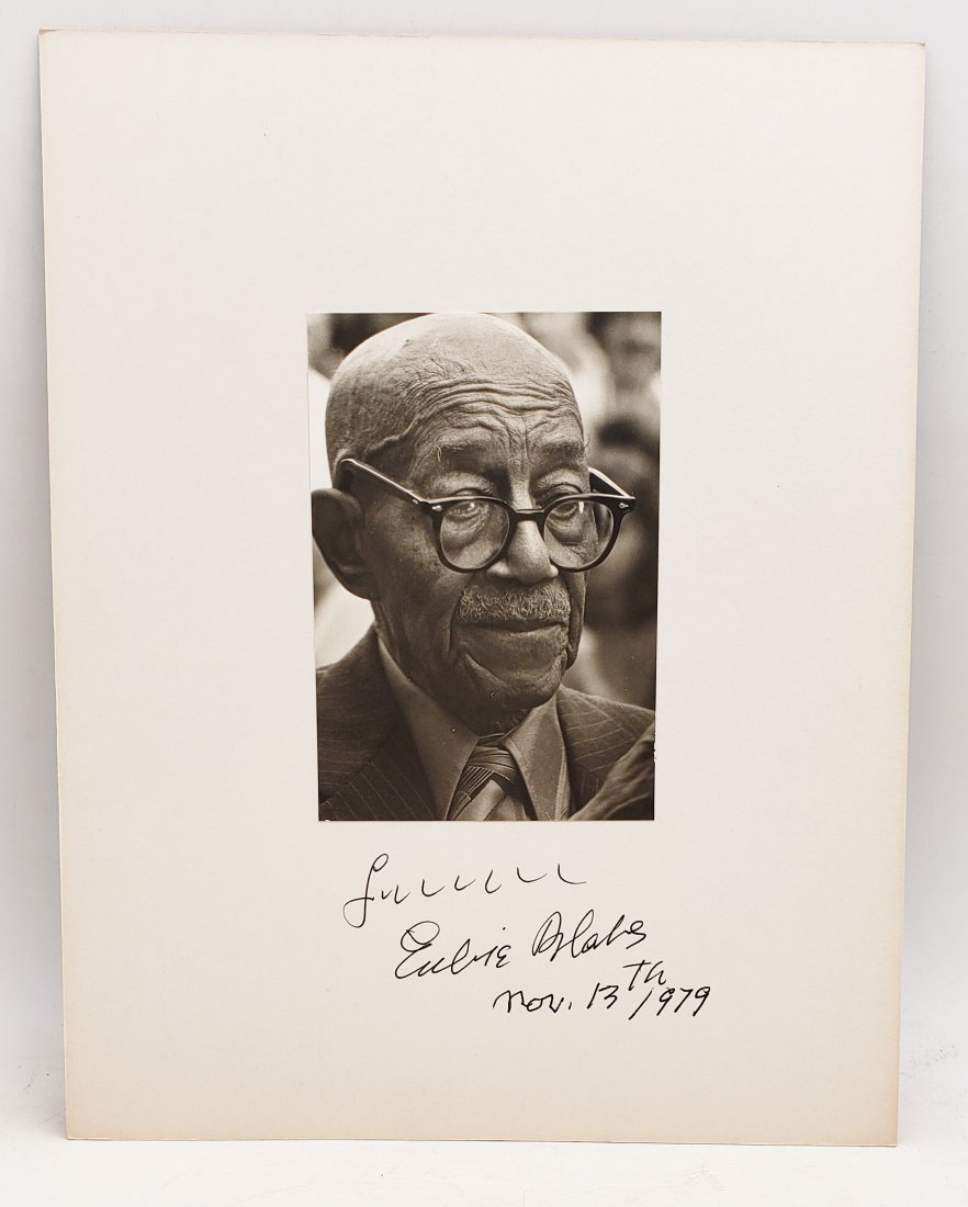Eubie Blake, 1979: Signed Photo Portrait: B/W photo of Eubie Blake, 1979 by P.Rankin- Smith mounted on art paper /board and signed on the margin by Eubie Blake, 1979. The signature is authentic with provenance. Image size : 4.25 x 6.5 inches.