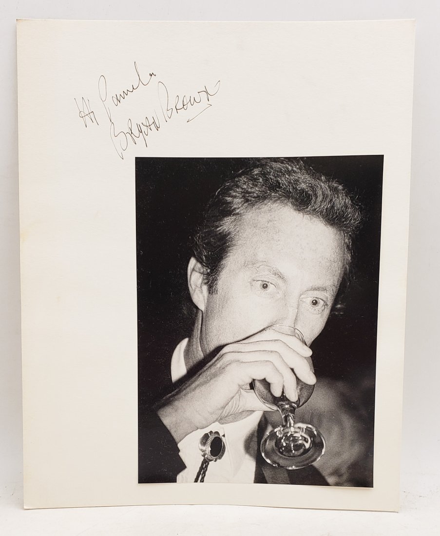 Bryan Brown: Signed Photo Portrait: B/W photo of Bryan Brown by P.Rankin- Smith mounted on art paper /board and signed on the margin by Bryan Brown. The signature is authentic with provenance. Image size : 6.75 x 9.5 inches. Mount size: