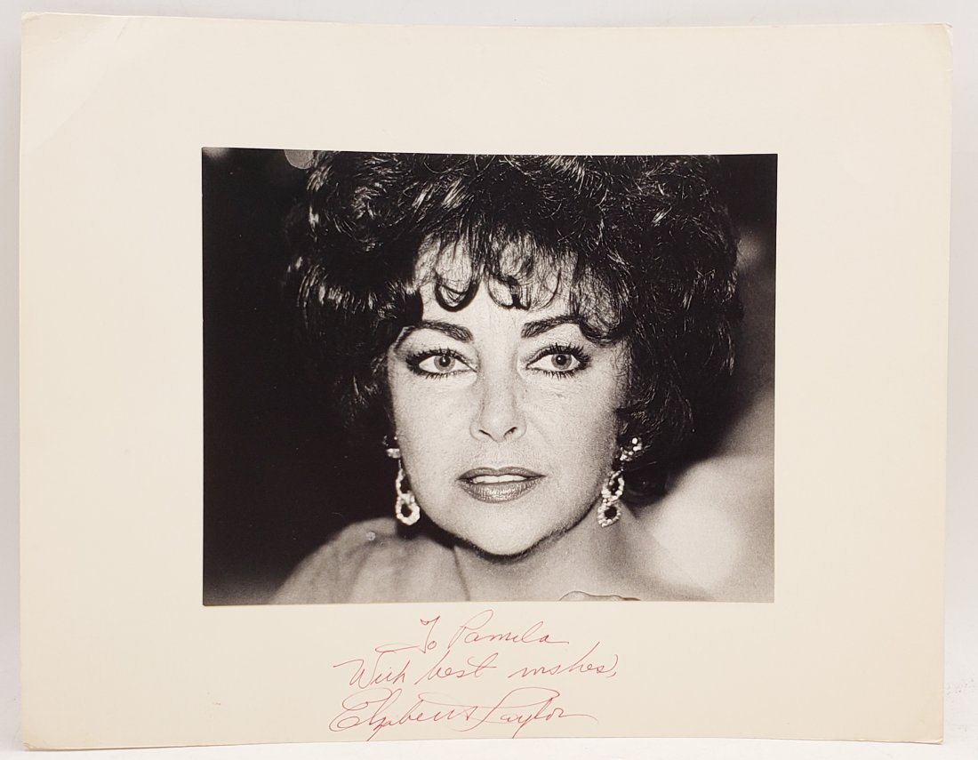 Elizabeth Taylor, 1985: Signed Photo Portrait: B/W photo of Elizabeth Taylor, 1985 by P.Rankin- Smith mounted on art paper /board and signed on the margin by Elizabeth Taylor. The signature is authentic with provenance. Image size : 7 x 8.5 inches