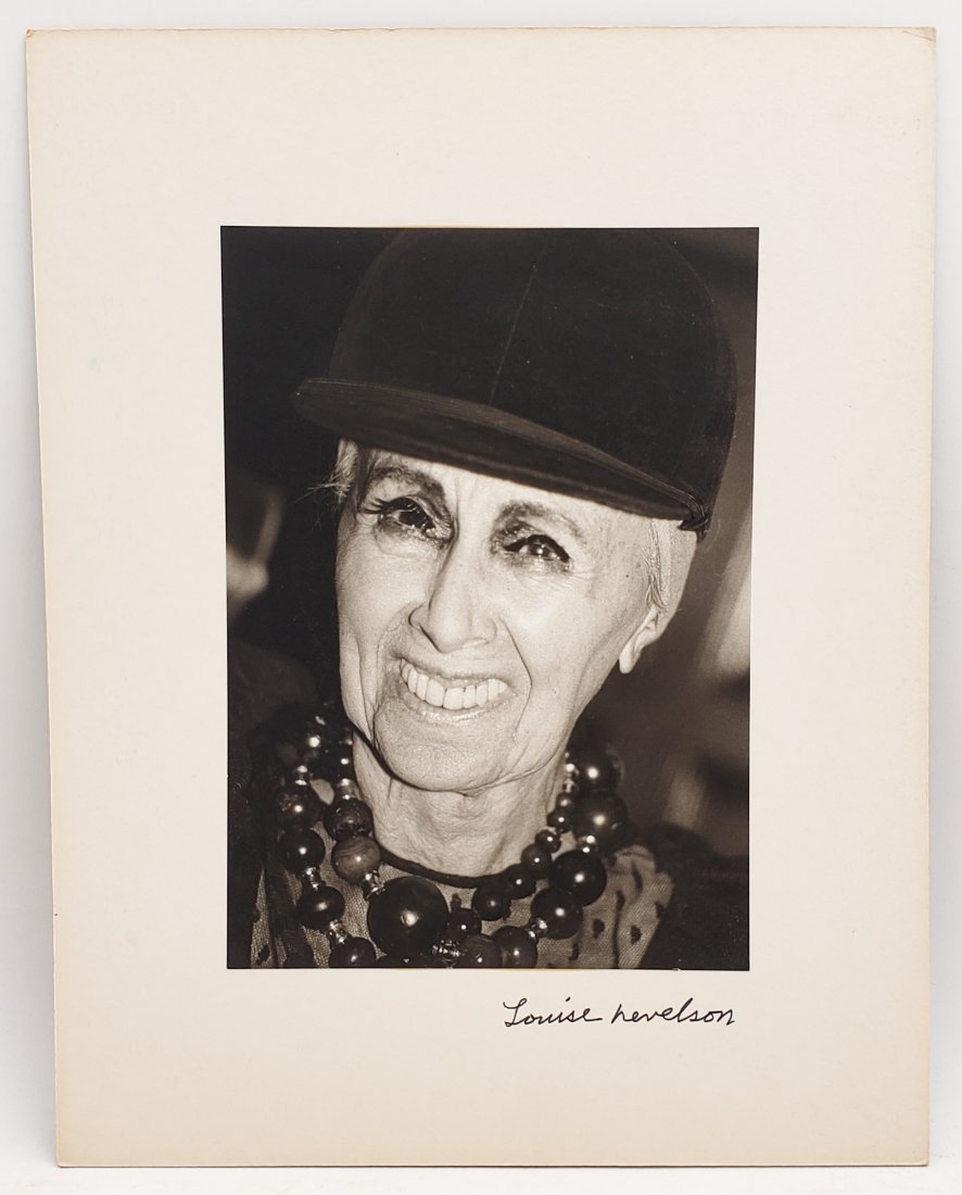 Louise Nevelson, 1982: Signed Photo Portrait: B/W photo of Louise Nevelson, 1982 by P.Rankin- Smith mounted on board and signed on the margin by Louise Nevelson. The signature is authentic with provenance. Image size : 9 x 6.5 inches. Mount size: