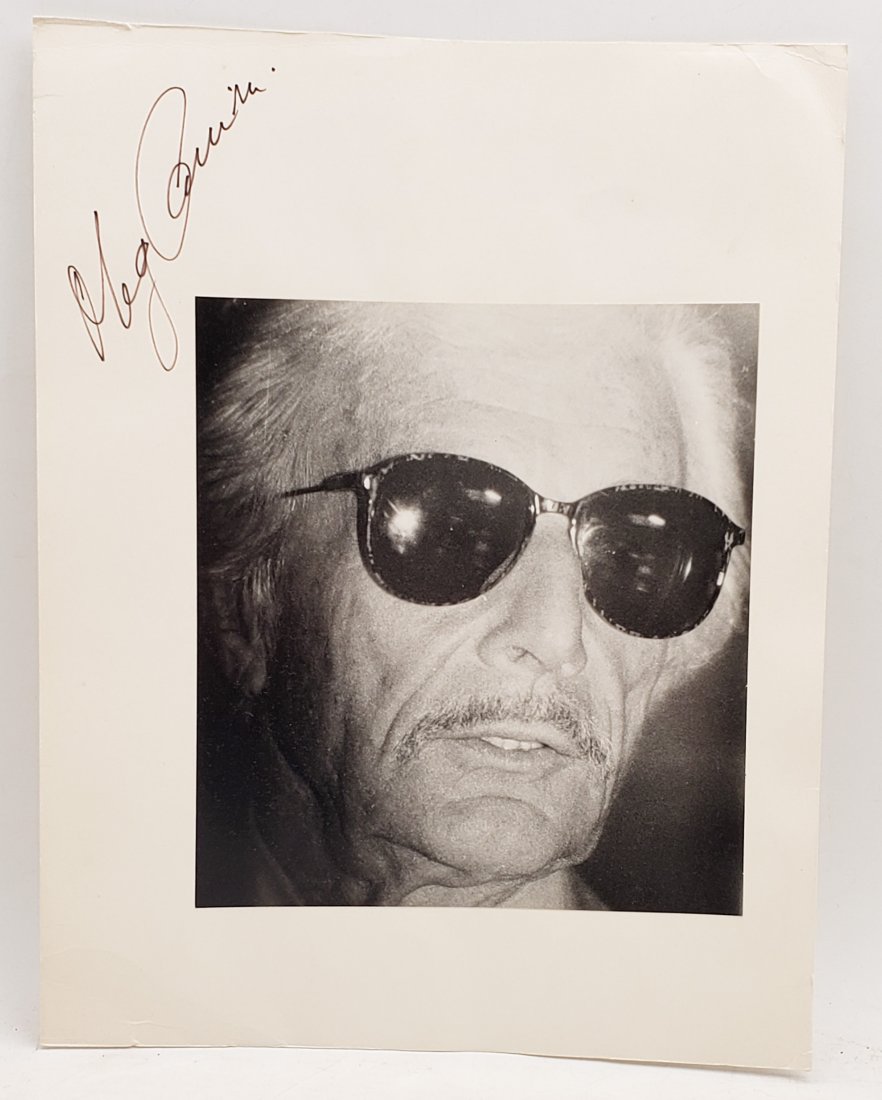 Oleg Cassini: Signed Photo Portrait: B/W photo of Oleg Cassini by P.Rankin- Smith mounted on art paper /board and signed on the margin by Oleg Cassini. The signature is authentic with provenance. Image size : 7.75 x 8.5 inches. Mount siz