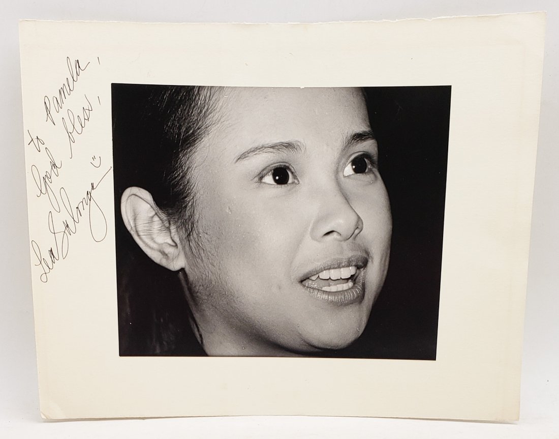 Lea Salonga, 1991: Signed Photo Portrait: B/W photo of Lea Salonga, 1991 by P. Rankin- Smith mounted on art paper and signed on the margin by Lea Salonga. The signature is authentic with provenance. Image size : 7.5 x 9.5 inches. Mount size: 