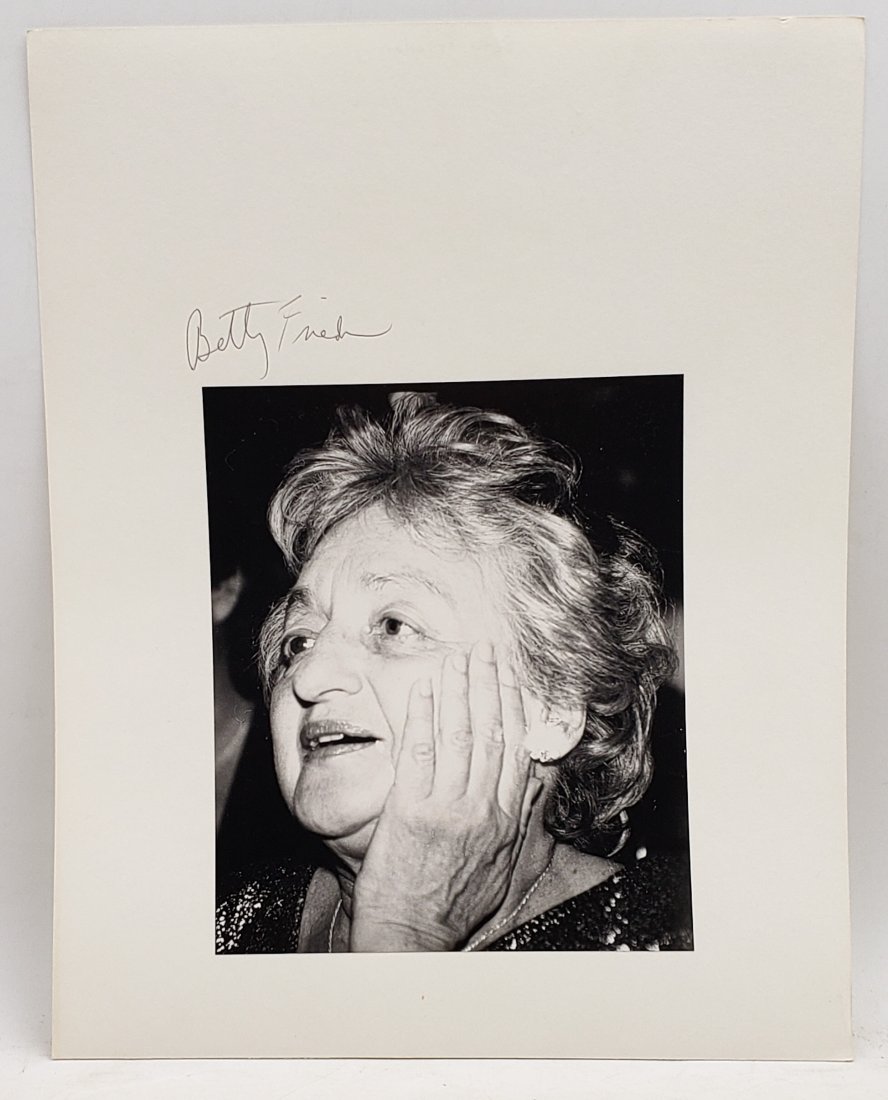 Betty Friedan: Signed Photo Portrait: B/W photo of Betty Friedan by P.Rankin- Smith mounted on art paper and signed on the margin by Betty Friedan. The signature is authentic with provenance. Image size : 6.5 x 7.75 inches. Mount size: 11