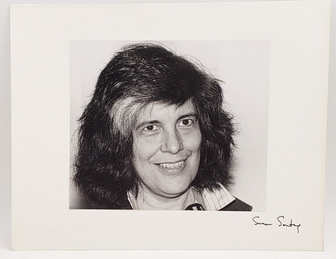Susan Sontag: Signed Photo Portrait: B/W photo of Susan Sontag by P.Rankin- Smith mounted on art paper /board and signed on the margin by Susan Sontag. The signature is authentic with provenance. Image size : 8.5 x 7.5 inches. Mount size