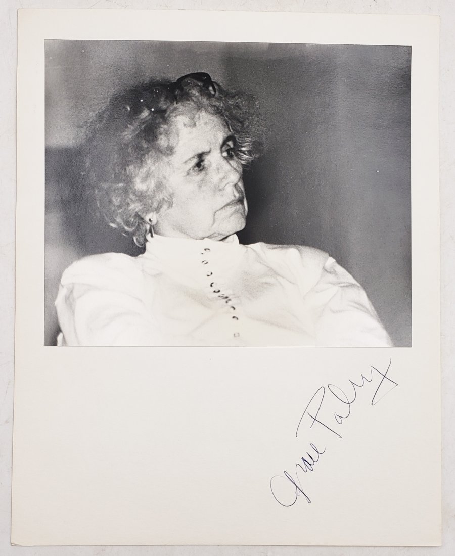 Grace Paley: Signed Photo Portrait: B/W photo of Grace Paley by P.Rankin- Smith mounted on art paper /board and signed on the margin by Grace Paley. The signature is authentic with provenance. Image size : 9.5 x 7.75 inches. Mount size: