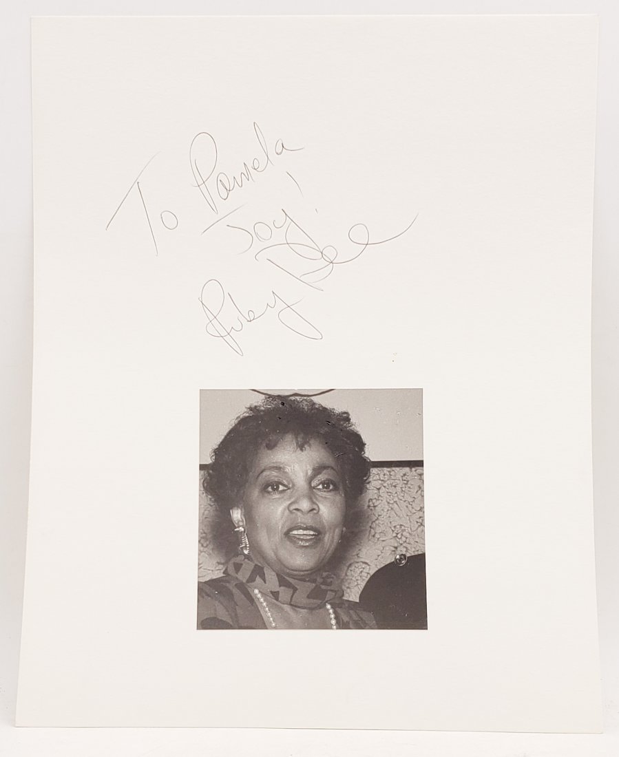 Ruby Dee: Signed Photo Portrait: B/W photo of Ruby Dee by P.Rankin- Smith mounted on art paper and signed on the margin by Ruby Dee. The signature is authentic with provenance. Image size : 4.5 x 4.5 inches. Mount size : 11 x 14 inch