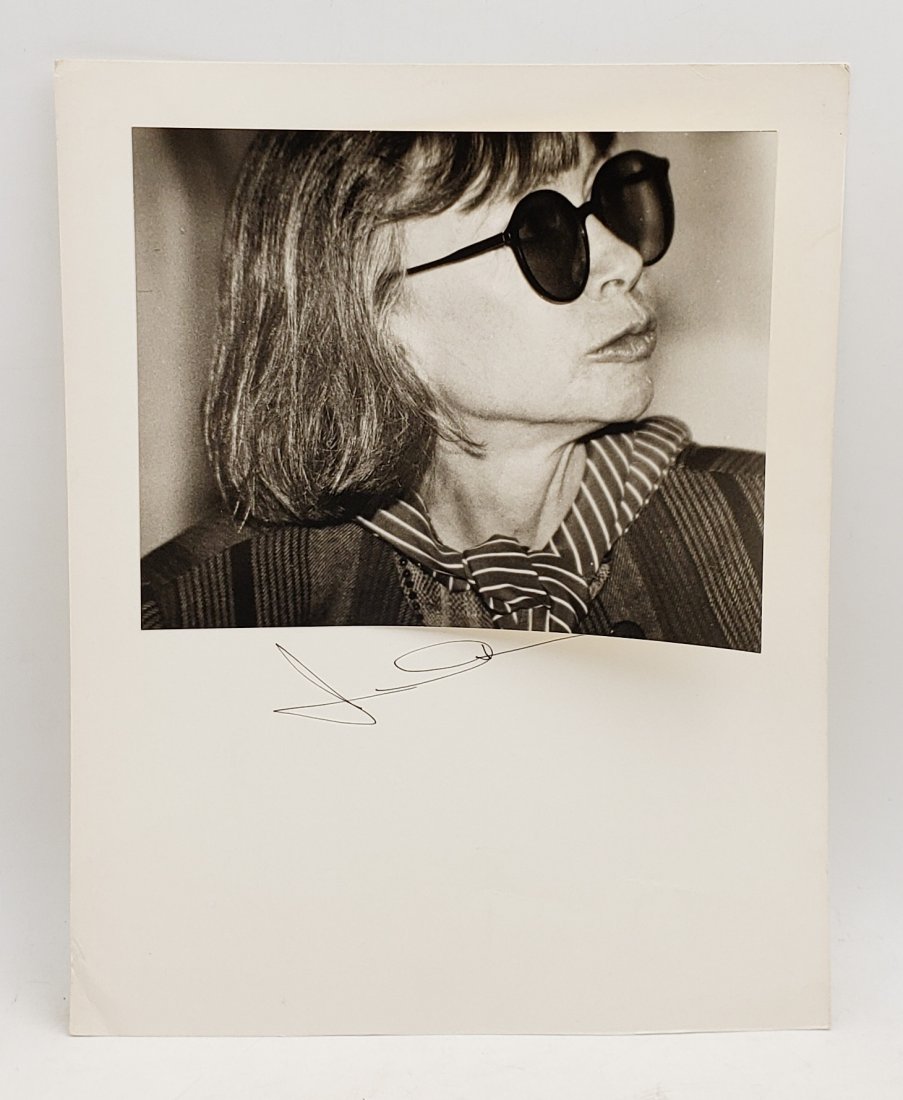 Joan Didion, 1987: Signed Photo Portrait: B/W photo of Joan Didion, 1987 by P.Rankin- Smith mounted on art paper /board and signed on the margin by Joan Didion. The signature is authentic with provenance. Image size : 7 x 9 inches. Mount size