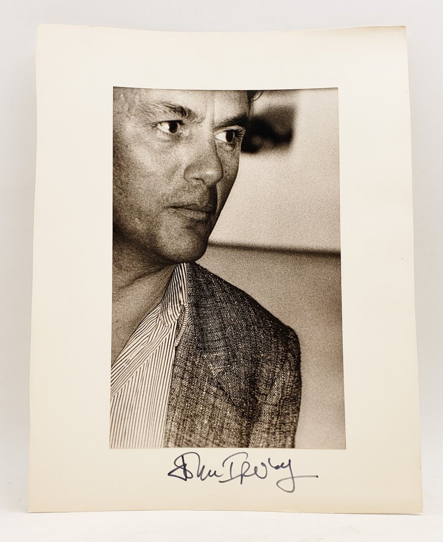 John Irving, 1983: Signed Photo Portrait: B/W photo of John Irving, 1983 by P.Rankin- Smith mounted on art paper /board and signed on the margin by John Irving. The signature is authentic with provenance. Image size : 6.75 x 10.5 inches. Moun