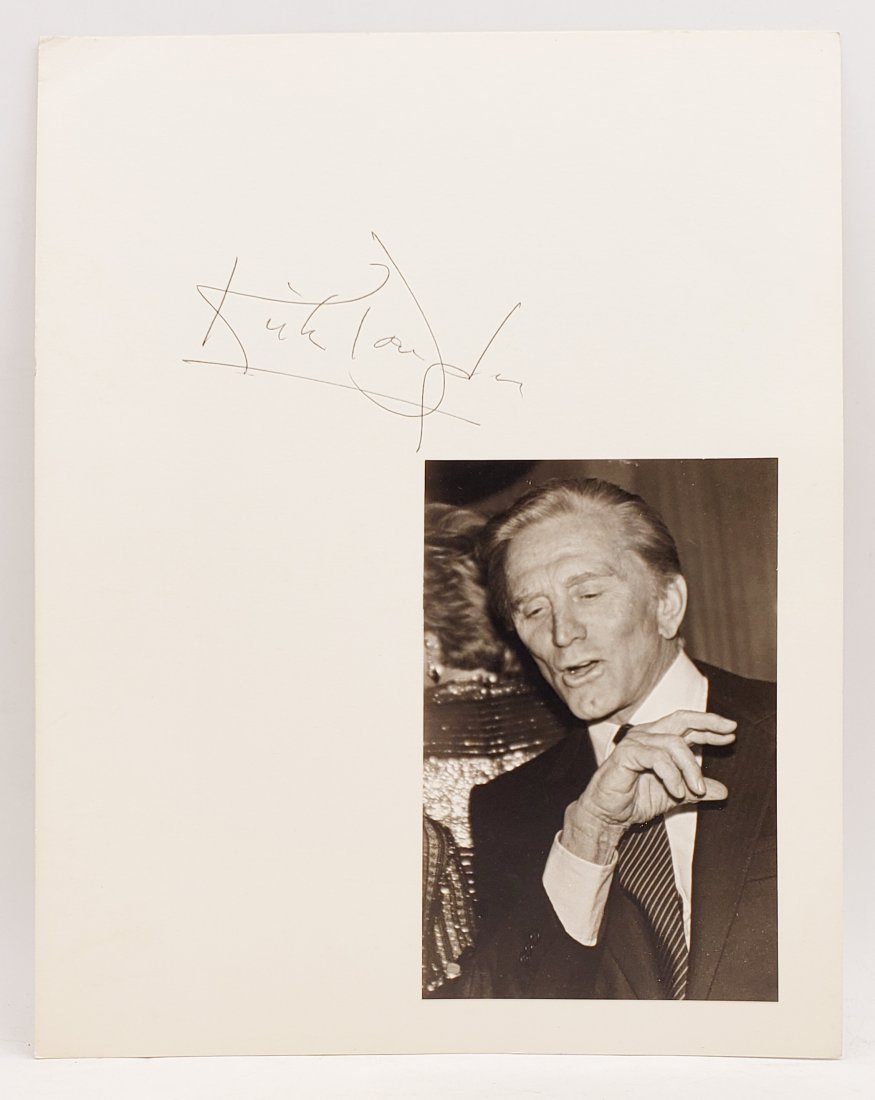 Kirk Douglas: Signed Photo Portrait: B/W photo of Kirk Douglas by P.Rankin- Smith mounted on art paper /board and signed on the margin by Kirk Douglas. The signature is authentic with provenance. Image size : 4.75 X 7.25 inches. Mount si