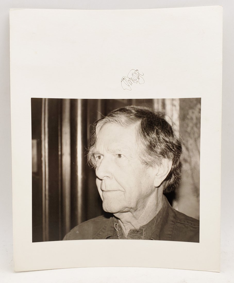 John Cage, 1989: Signed Photo Portrait: B/W photo of John Cage by P.Rankin- Smith mounted on art paper /board and signed on the margin by John Cage. The signature is authentic with provenance. Image size : 9 x 7.5 inches. Mount size: 11 x 1