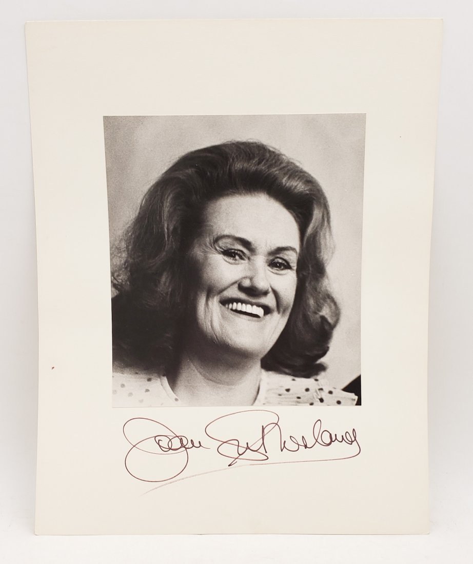 Joan Sutherland: Signed Photo Portrait: B/W photo of Joan Sutherland by P.Rankin- Smith mounted on art paper /board and signed on the margin by Joan Sutherland. The signature is authentic with provenance. Image size : 7 x 8 inches. Mount si