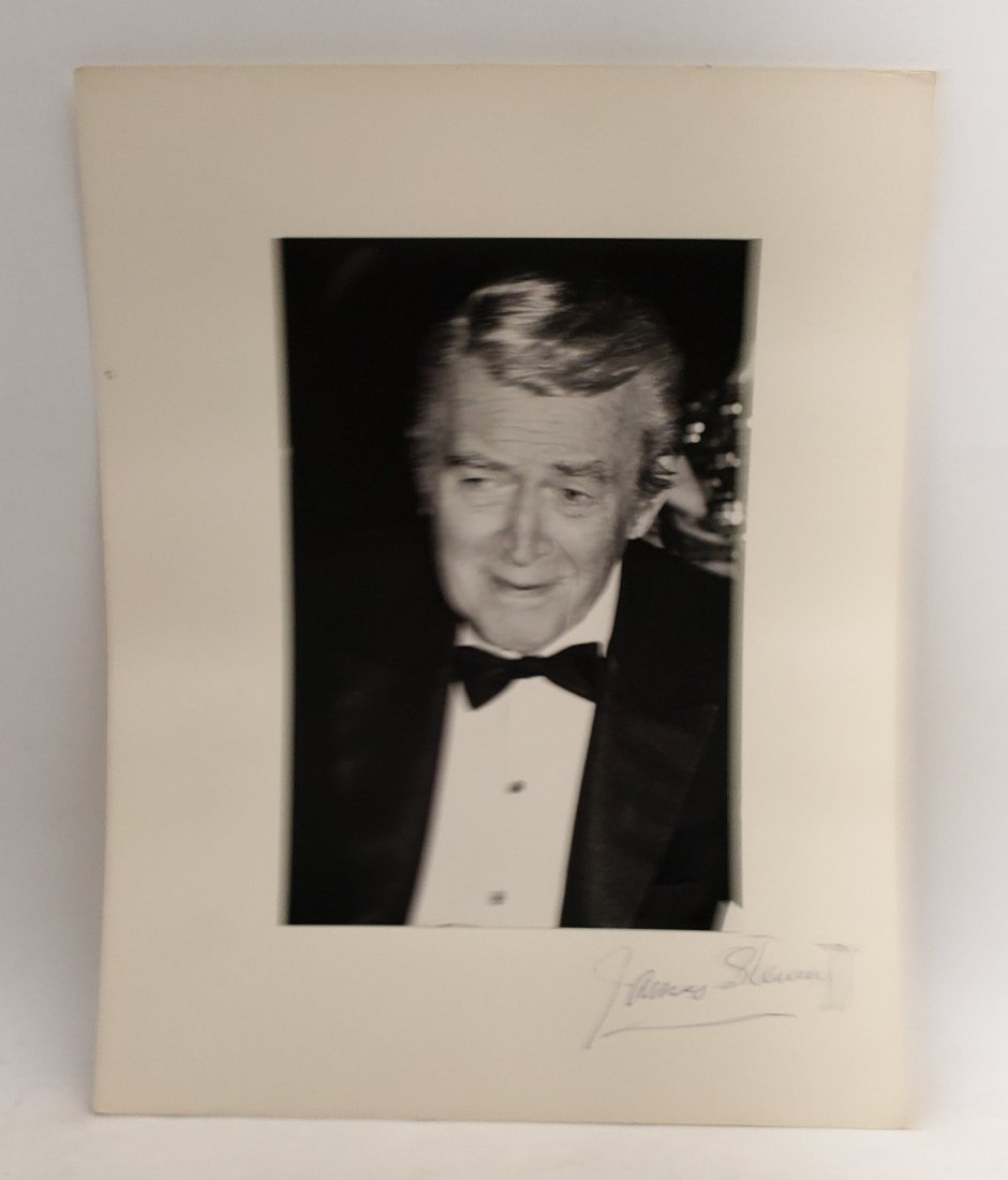 James Stewart: Signed Photo Portrait: B/W photo of James " Jimmy" Stewart by P.Rankin- Smith mounted on art paper /board and signed on the margin by James Stewart. The signature is authentic with provenance. Image size : 6 x 9.25 inches. 
