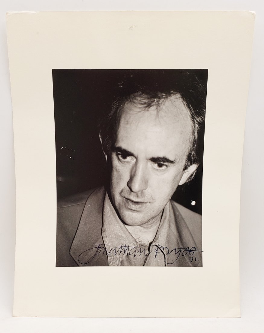 Jonathan Pryce: Signed Photo Portrait: B/W photo of Jonathan Pryce by P.Rankin- Smith mounted on art paper /board and signed on the margin by Jonathan Pryce. The signature is authentic with provenance. Image size : 7 x 9.25 inches. Mount s