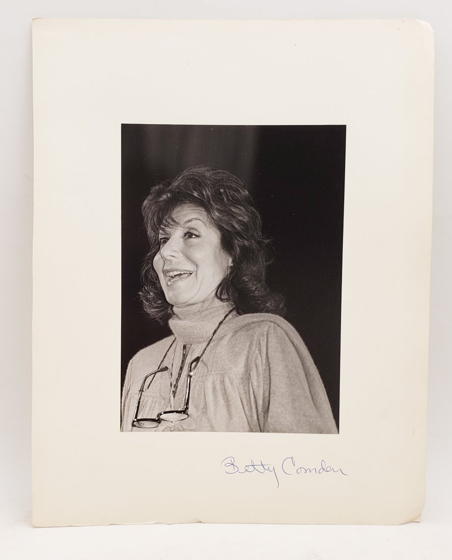 Betty Comden: Signed Photo Portrait: B/W photo of Betty Comden by P.Rankin- Smith mounted on art paper /board and signed on the margin by Betty Comden. The signature is authentic with provenance. Image size : 6.25 x 8.75 inches. Mount si