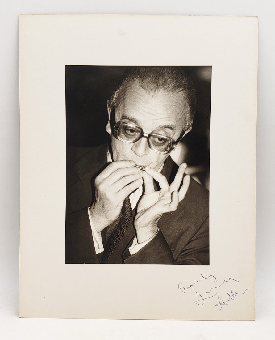 Larry Adler: Signed Photo Portrait: B/W photo of Larry Adler by P.Rankin- Smith mounted on art paper /board and signed on the margin by Larry Adler. The signature is authentic with provenance. Image size : 6.5 x 9 inches. Mount size: 11