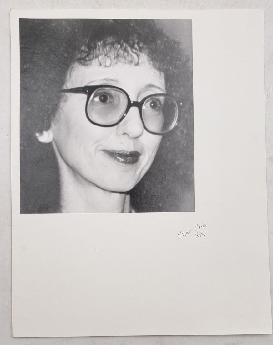 Joyce Carol Oates: Signed Photo Portrait: B/W photo of Joyce Carol Oates by P.Rankin- Smith mounted on art paper /board and signed on the margin by Joyce Carol Oates. The signature is authentic with provenance. Image size : 7.5 x 8.25 inches.
