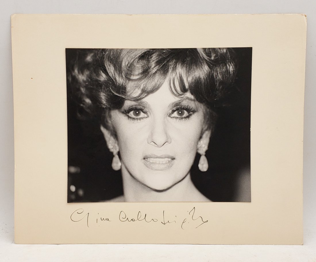 Gina Lollobrigida: Signed Photo Portrait: B/W photo of Gina Lollobrigida by P.Rankin- Smith mounted on art paper /board and signed on the margin by Gina Lollobrigida. The signature is authentic with provenance. Image size : 8.75 x 7.5 inches.