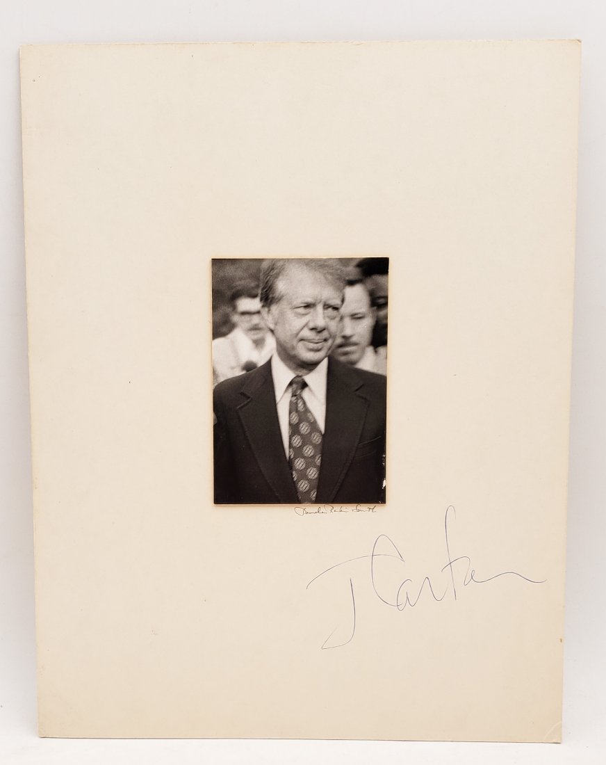 Jimmy Carter, 1984: Signed Photo Portrait: B/W photo of Jimmy Carter, 1984 by P.Rankin- Smith mounted on art paper and signed on the margin by Jimmy Carter. The signature is authentic with provenance. Image size : 3.75 x 4.5 inches. Mount size