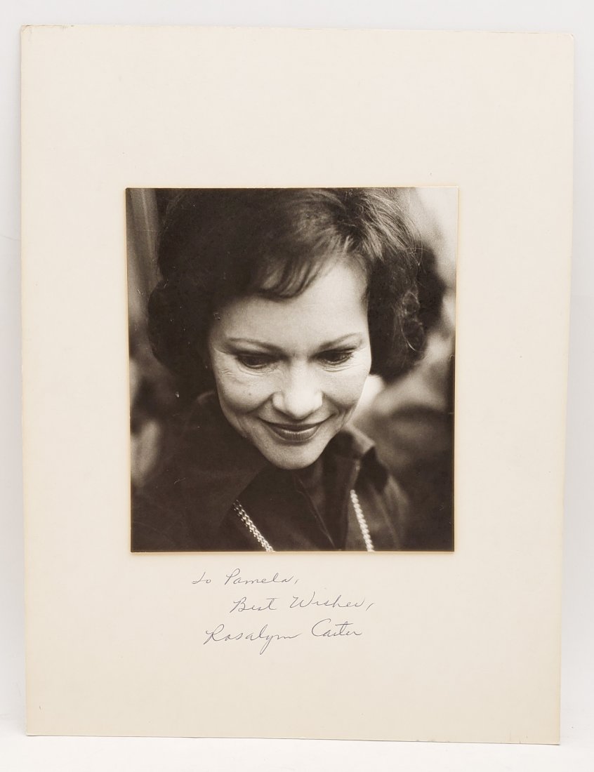 Rosalyn Carter: Signed Photo Portrait: B/W photo of Rosalyn Carter by P.Rankin- Smith mounted on art paper and signed on the margin by Rosalyn Carter. The signature is authentic with provenance. Image size : 6.25 x 7 inches. Mount size: 11
