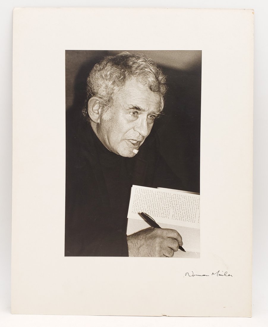 Norman Mailer: Signed Photo Portrait: B/W photo of Norman Mailer by P.Rankin- Smith mounted on art paper /board and signed on the margin by Norman Mailer. The signature is authentic with provenance. Image size : 6.25 x 9.5 inches. Mount s