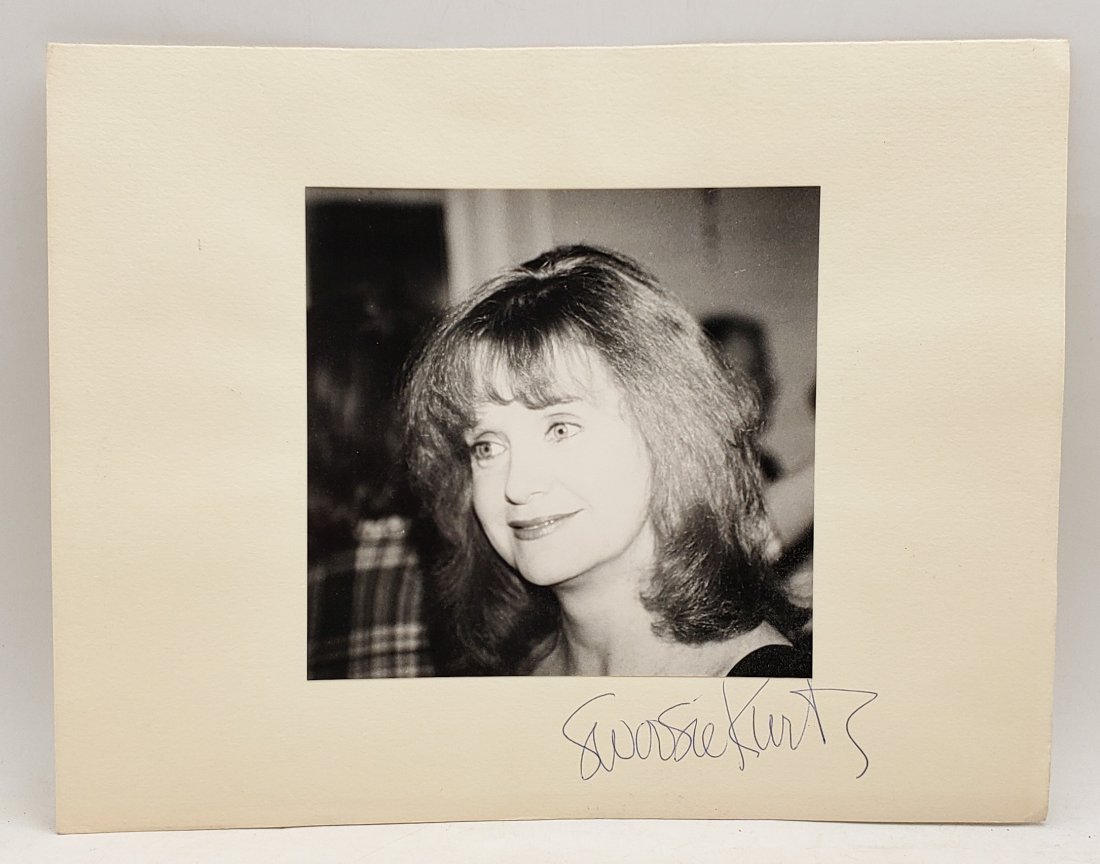 Swoosie Kurtz: Signed Photo Portrait: B/W photo of Swoosie Kurtz by P.Rankin- Smith mounted on art paper /board and signed on the margin by Swoosie Kurtz. The signature is authentic with provenance. Image size : 7.25 x 7 inches. Mount siz
