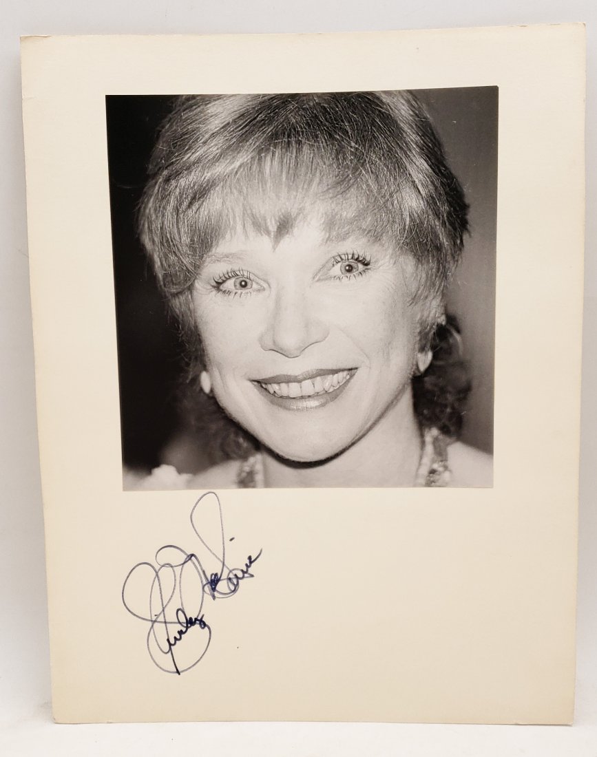 Shirley MacLaine: Signed Photo Portrait: Photo by Pamela Rankin - Smith - Shirley MacLaine: Signed Photo PortraitB/W photo of Shirley MacLaine by P.Rankin- Smith mounted on art paper /board and signed on the margin by Shirley MacLaine. The s