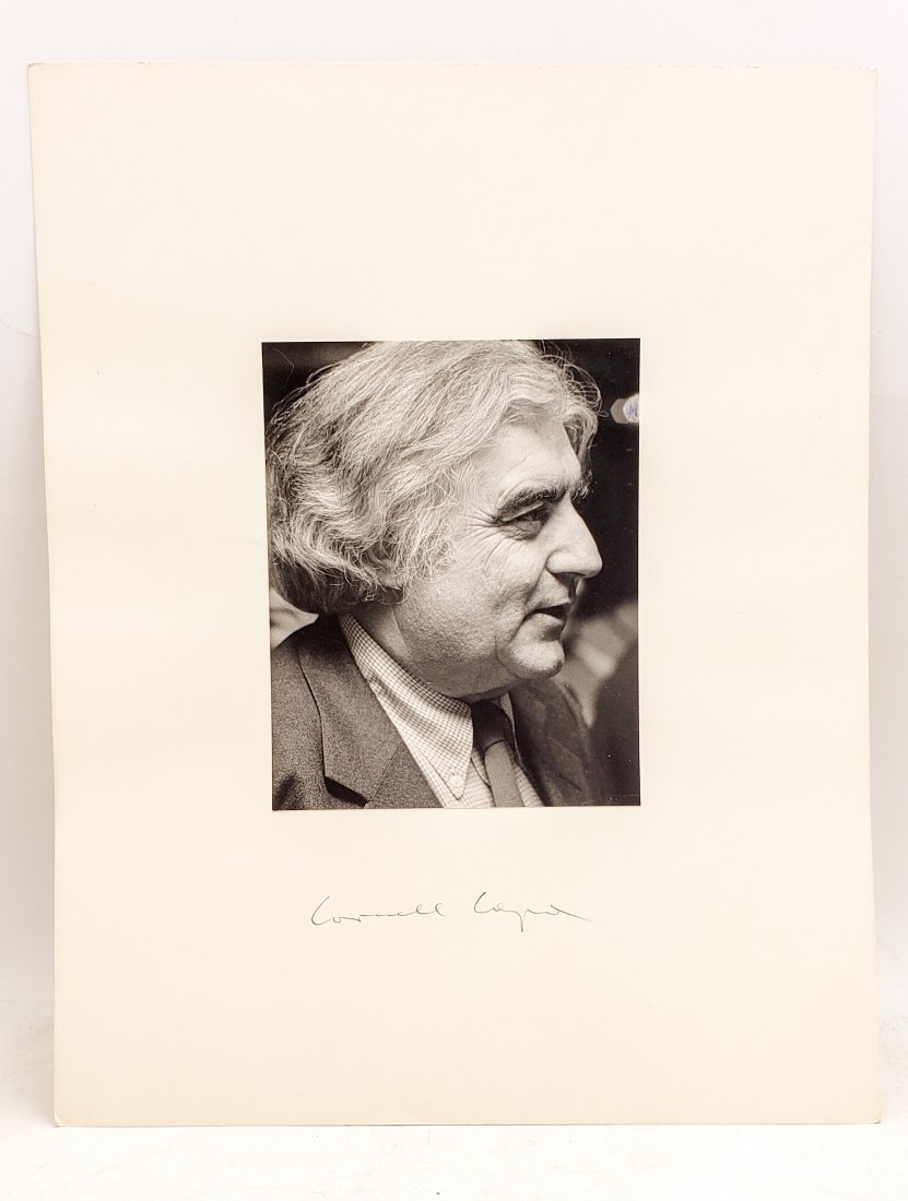 Cornell Capa : Signed Photo Portrait: B/W photo of Cornell Capa by P.Rankin- Smith mounted on art paper /board and signed on the margin by Cornell Capa. The signature is authentic with provenance. Image size : 6.25 x 5 inches. Mount size: