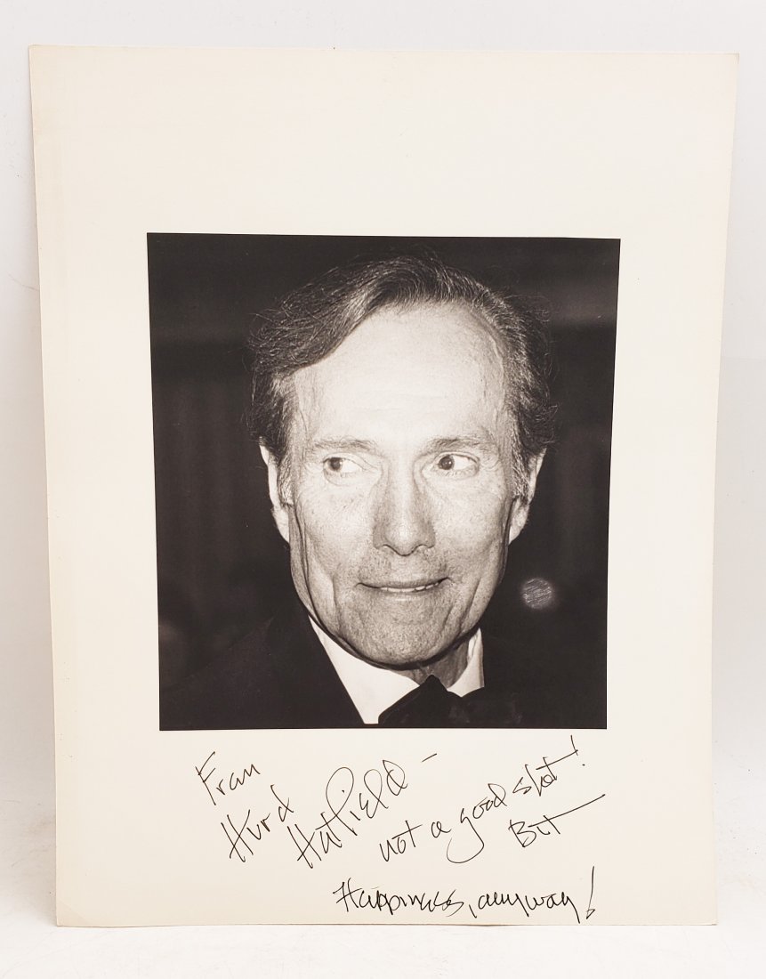 Hurd Hatfield : Signed Photo Portrait: B/W photo of Hurd Hatfield by P.Rankin- Smith mounted on art paper /board and signed on the margin by Hurd Hatfield. The signature is authentic with provenance. Image size : 7.5 x 8 inches. Mount size