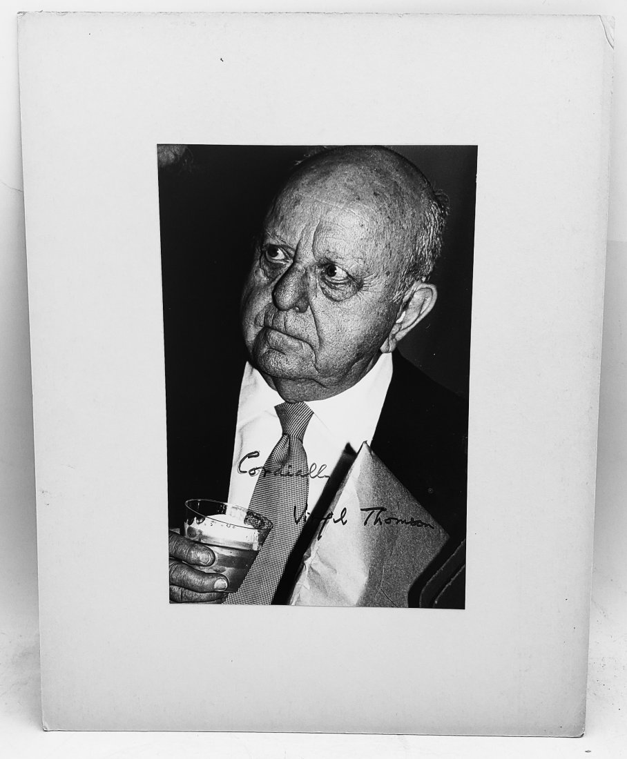 Virgil Thomson : Signed Photo Portrait: B/W photo of Virgil Thomson by P.Rankin- Smith mounted on art paper /board and signed on the image by Virgil Thomson. The signature is authentic with provenance. Image size : 6 x 9 inches. Mount size: