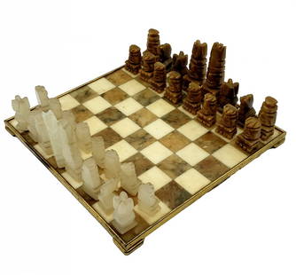 Vintage Stone Aztec Style Chess Set: Vintage quartz and onyx stone Aztec chess set with marble board in a metal frame. This is a vintage (from the 1960s or early 1970s) and complete Aztec Chess Set hand-carved out of Onyx stone and