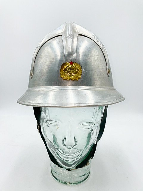 Vintage Soviet Era Fire Helmet : Czechoslovak: Brushed aluminum helmet with leather chin strap, cushioned leather interior, and green wool felt lining of the inner brim. The center front shows Soviet Fire Department Device of Gold Laurels, Red Sta