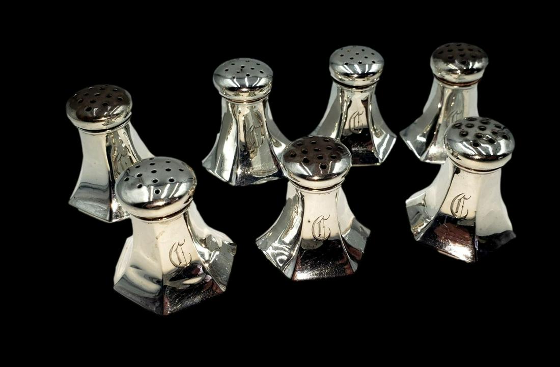 Four Sterling Silver Salt and Pepper Sets : Silver Weight 2.50 OZ: Eight total shakers of sterling silver, monogrammed with Gothic font " C" and hallmarked on bottom of each, 1.75 inches. Total Silver weight 2.50 Troy Ounces. Provenance : The Olive Bridge Collection